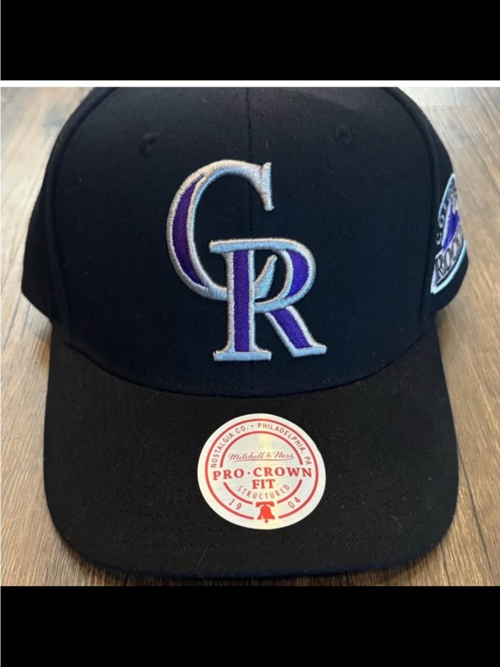 Mitchell & Ness Colorado Rockies Black Hat with Purple and Silver Logo